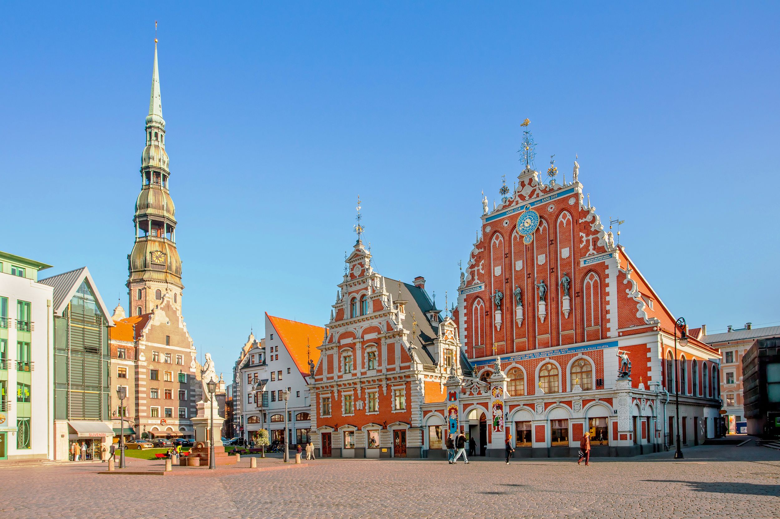 RIGA, LATVIA - September 9, 2008: Tourists admiring Town Hall Square w