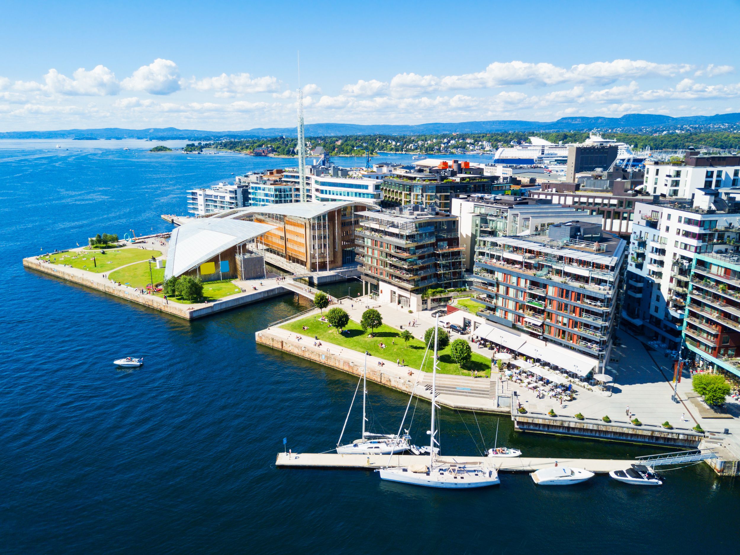 Oslo harbor or harbour at the Aker Brygge neighbourhood in Oslo. Oslo 