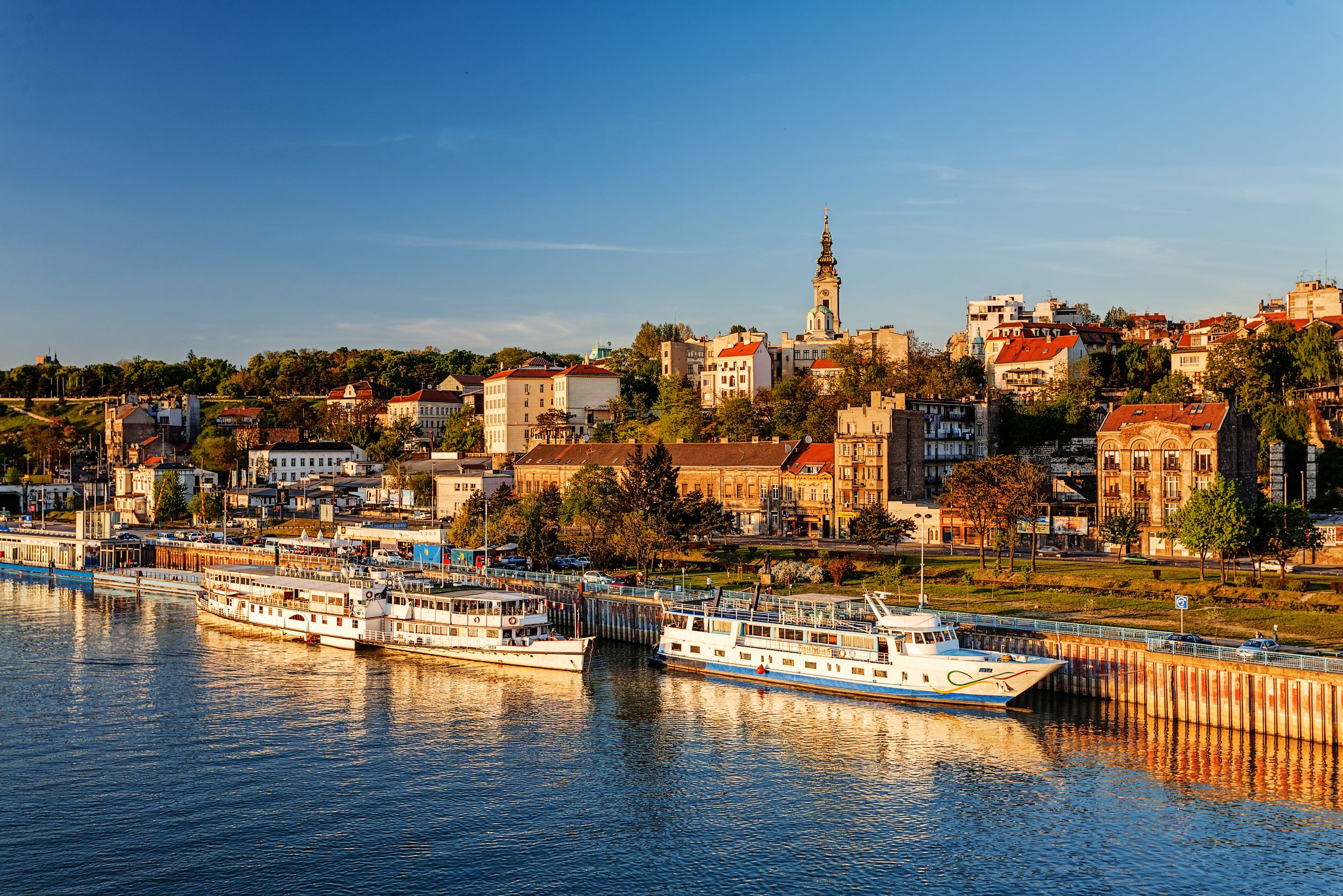 Belgrade from river Sava with tourist riverboats on a sunny day