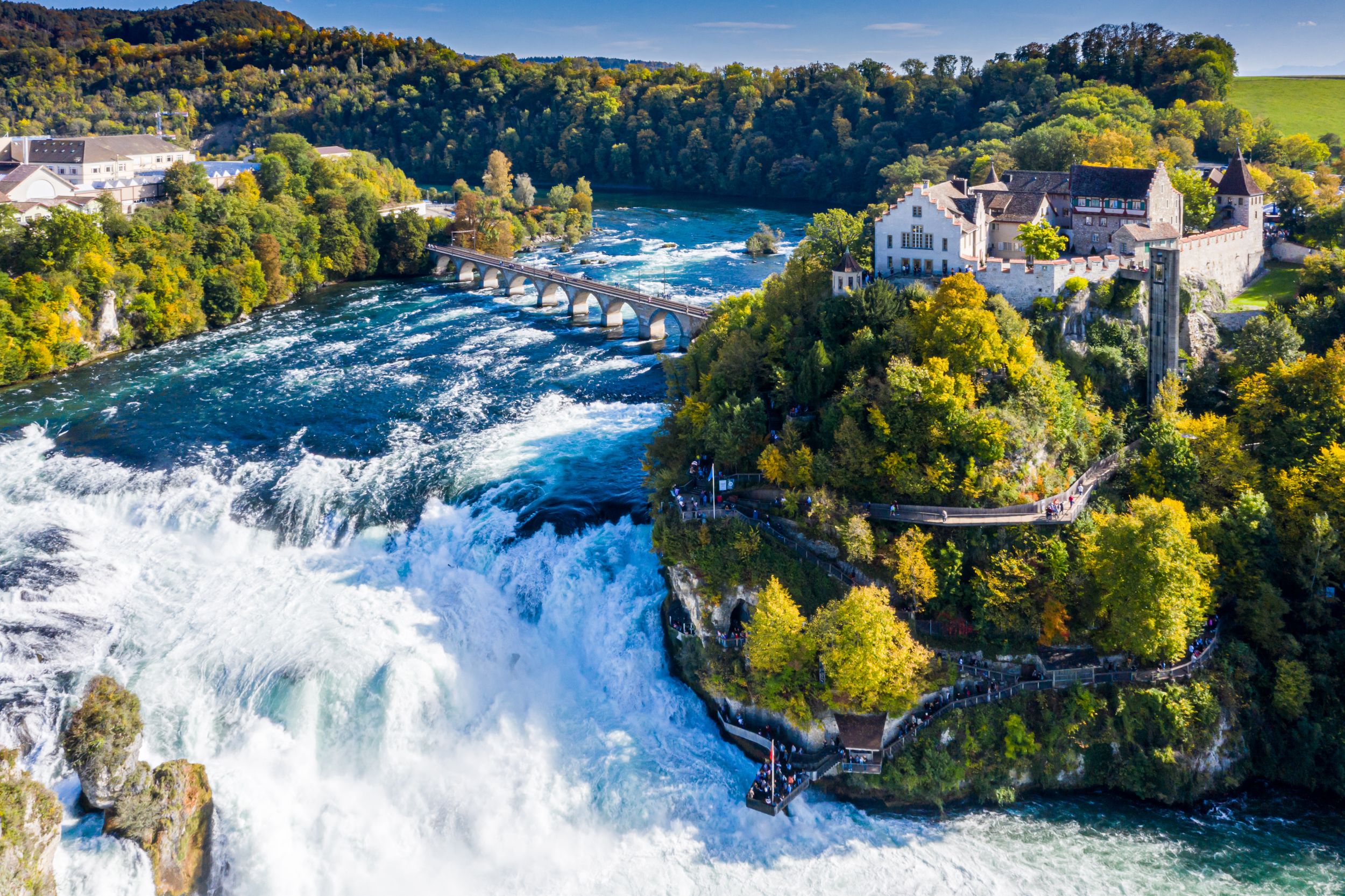 Rhine Falls or Rheinfall, Switzerland panoramic aerial view. Tourist b