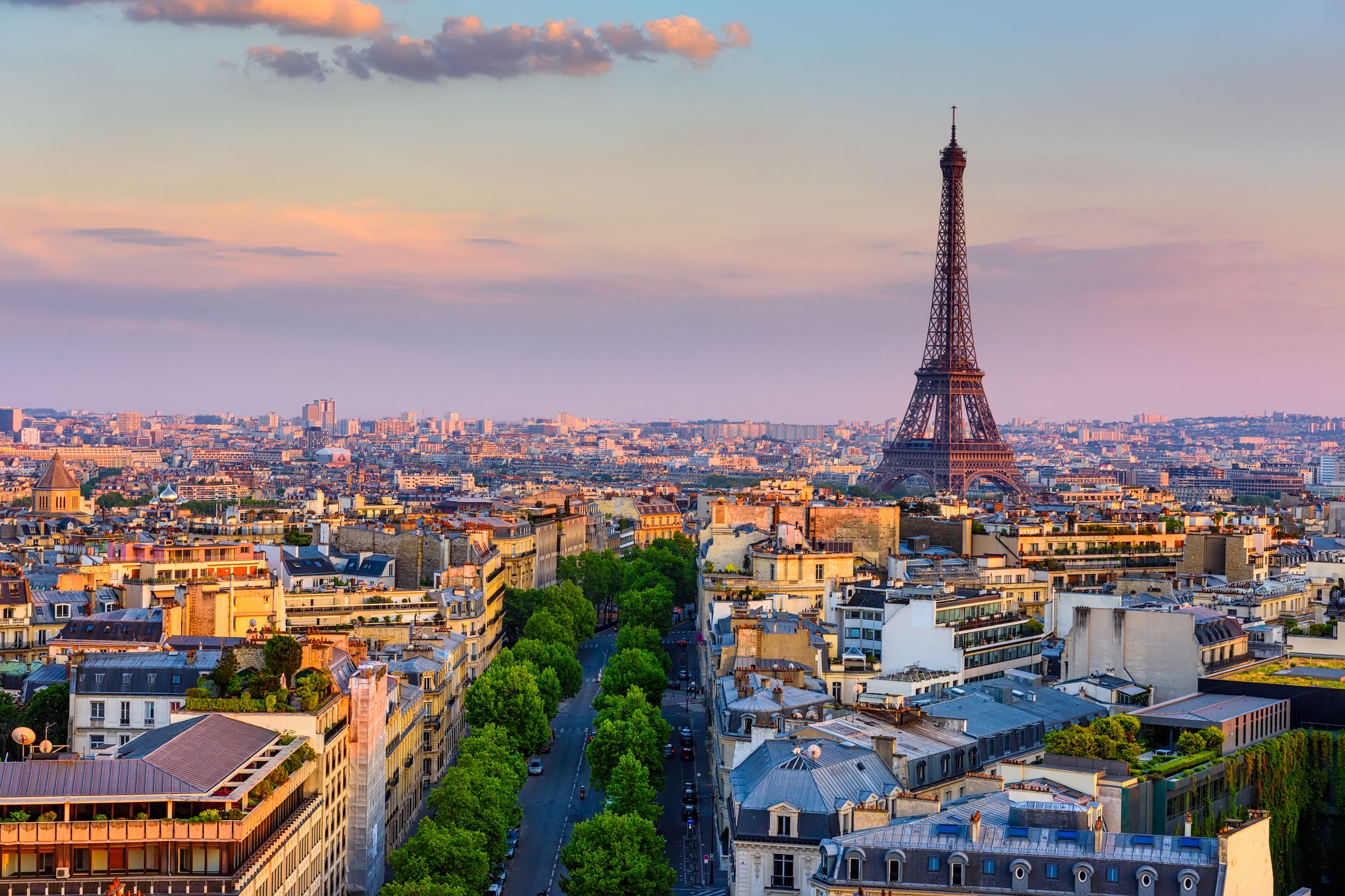 Skyline of Paris with Eiffel Tower in Paris, France. Panoramic sunset