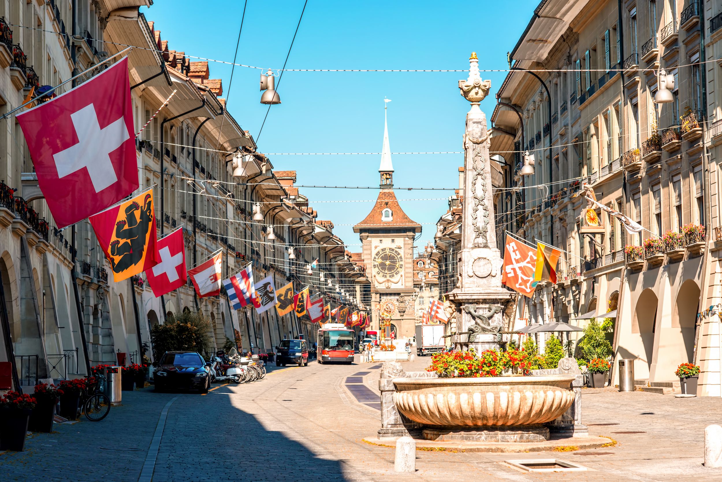 Street view on Kramgasse with fountain and clock tower in the old town