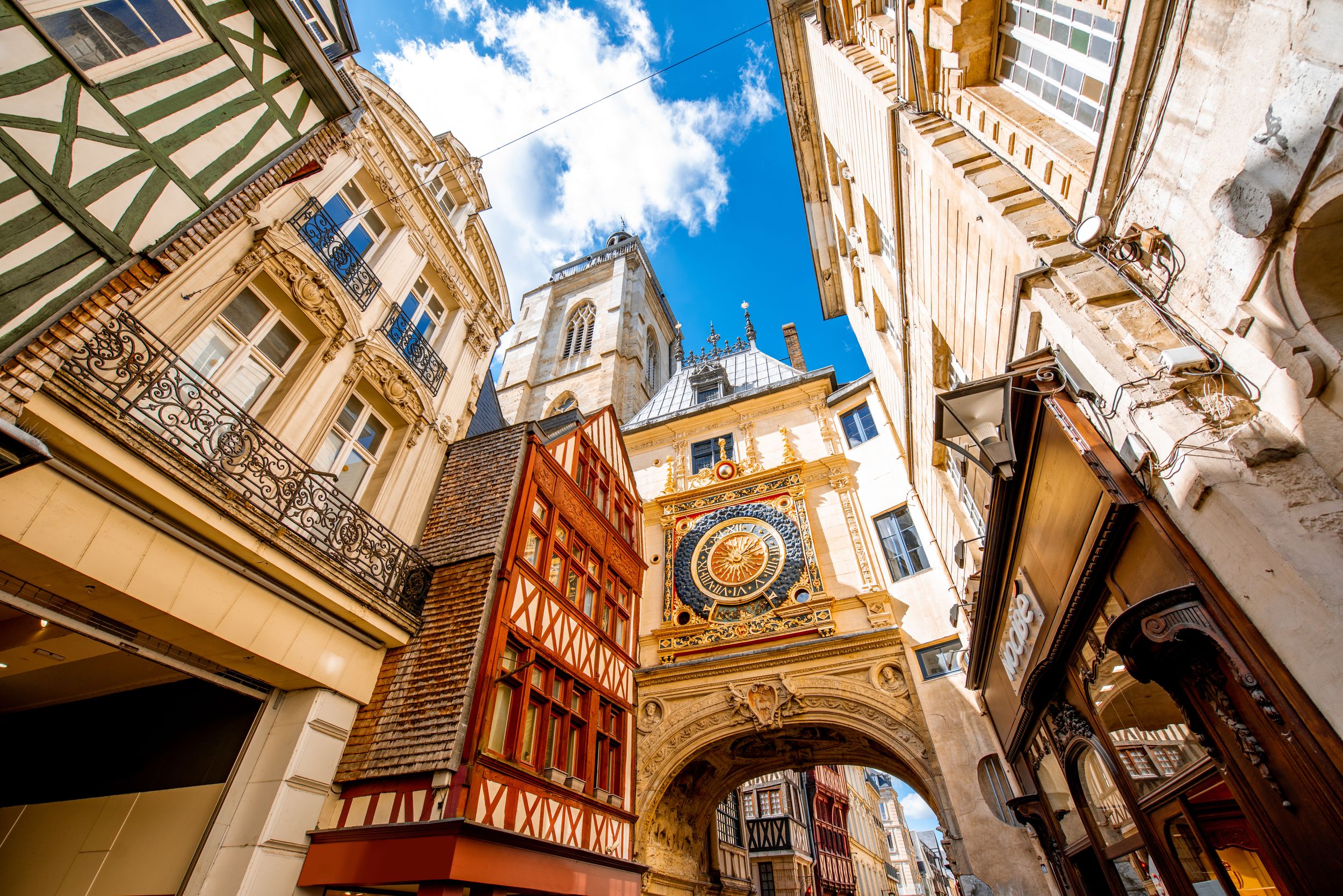 Street view with famous Great Clock astronomical clock in Rouen, the c