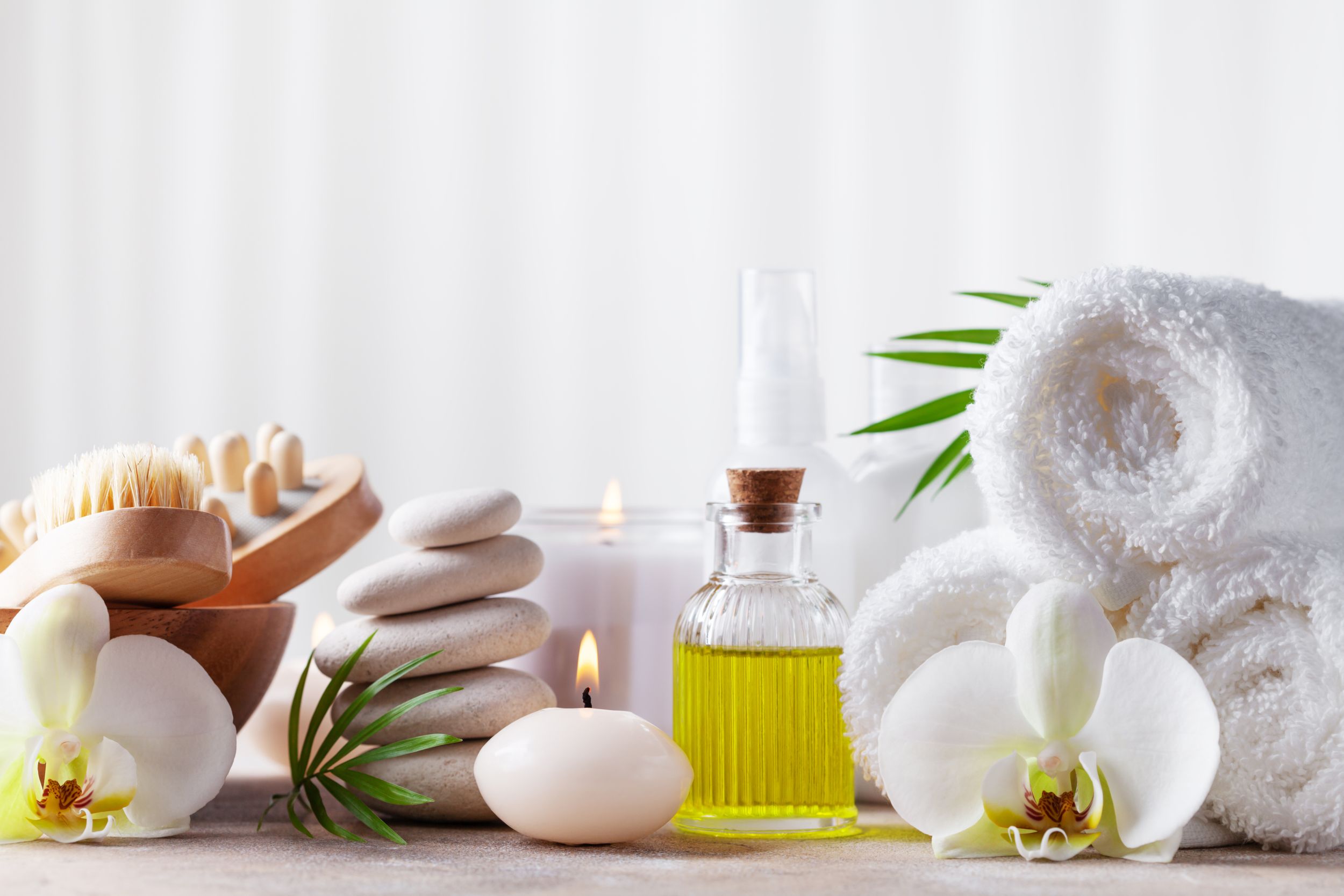 Spa, beauty treatment and wellness background with massage pebbles, or