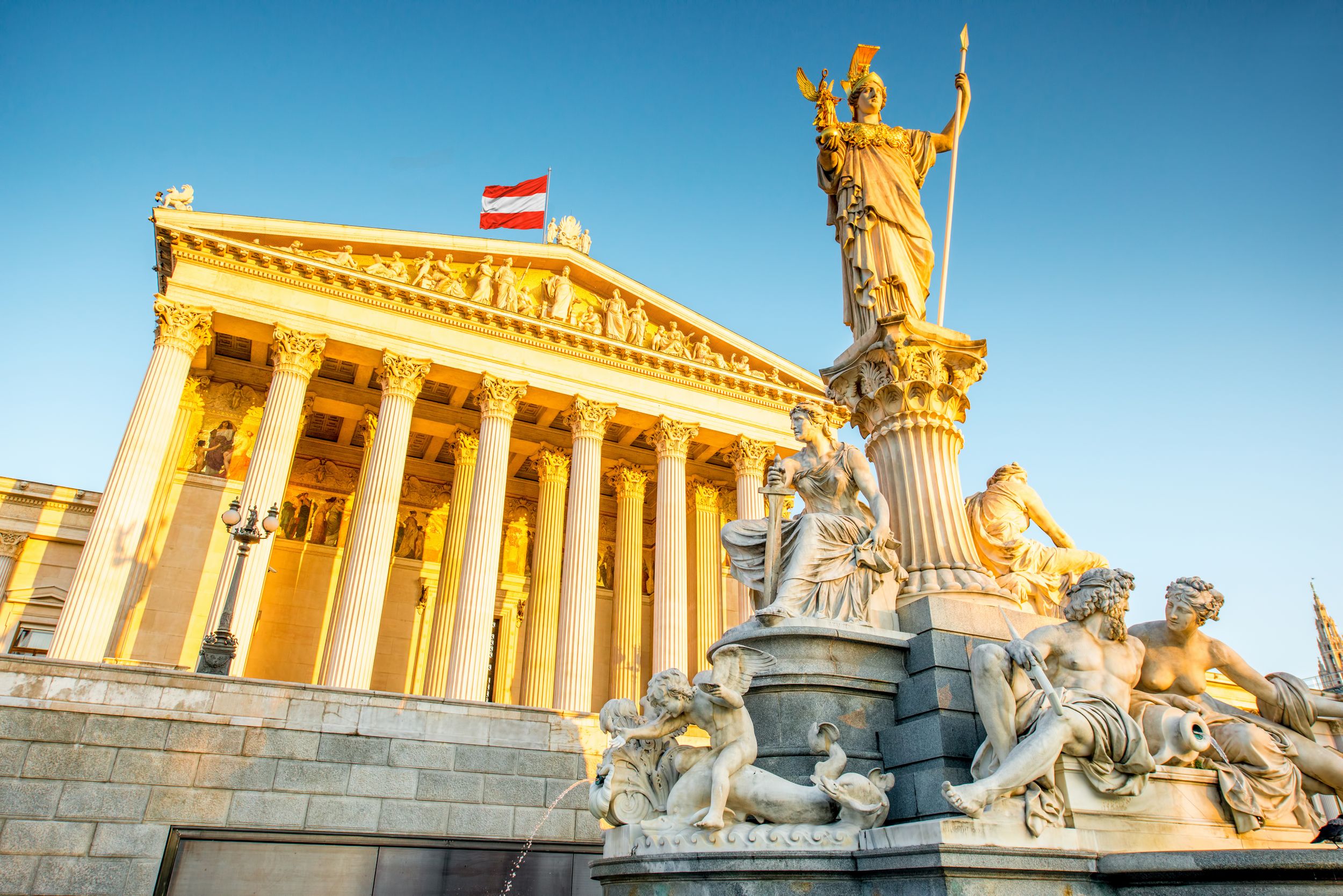 Austrian parliament building with Athena statue on the front in Vienna