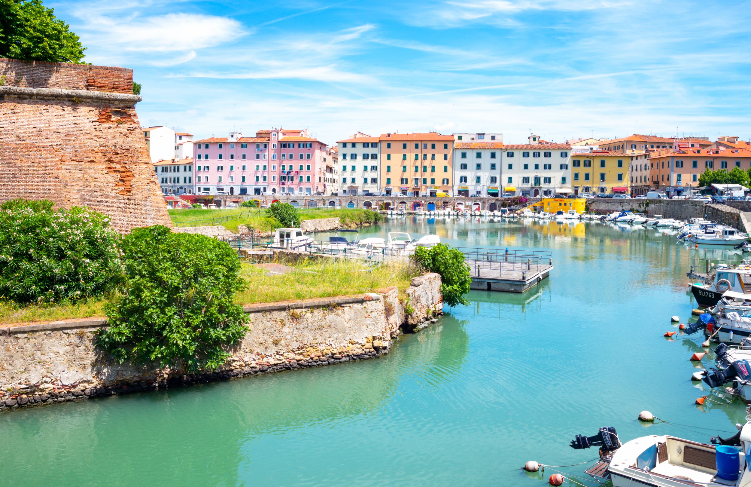 Livorno, Italy -May 25,2016: The colorfull houses on the canal vith th
