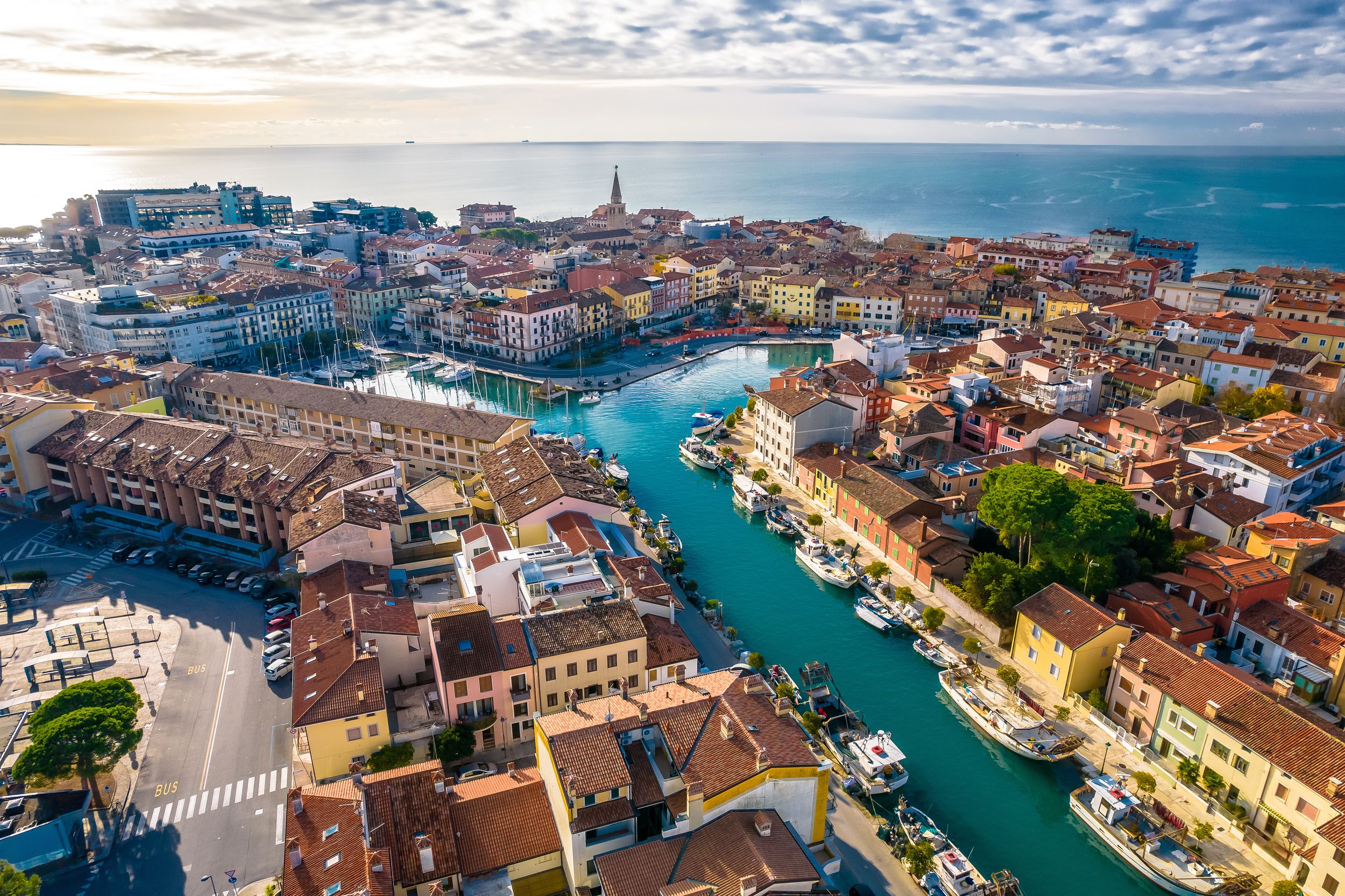 Town of Grado colorful architecture and channels aerial view, Friuli-V