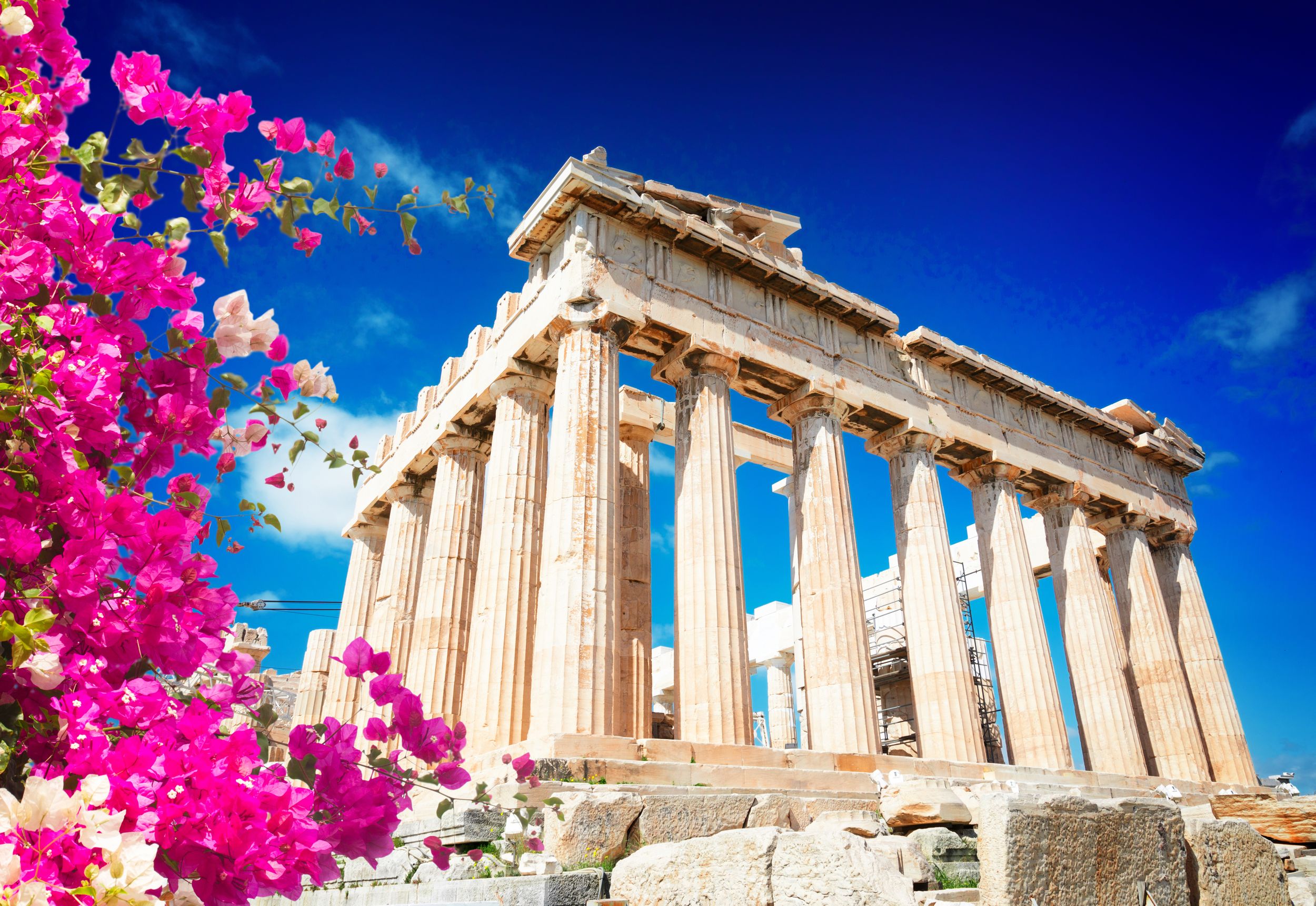 Parthenon temple over bright blue sky background, Acropolis hill, Athe