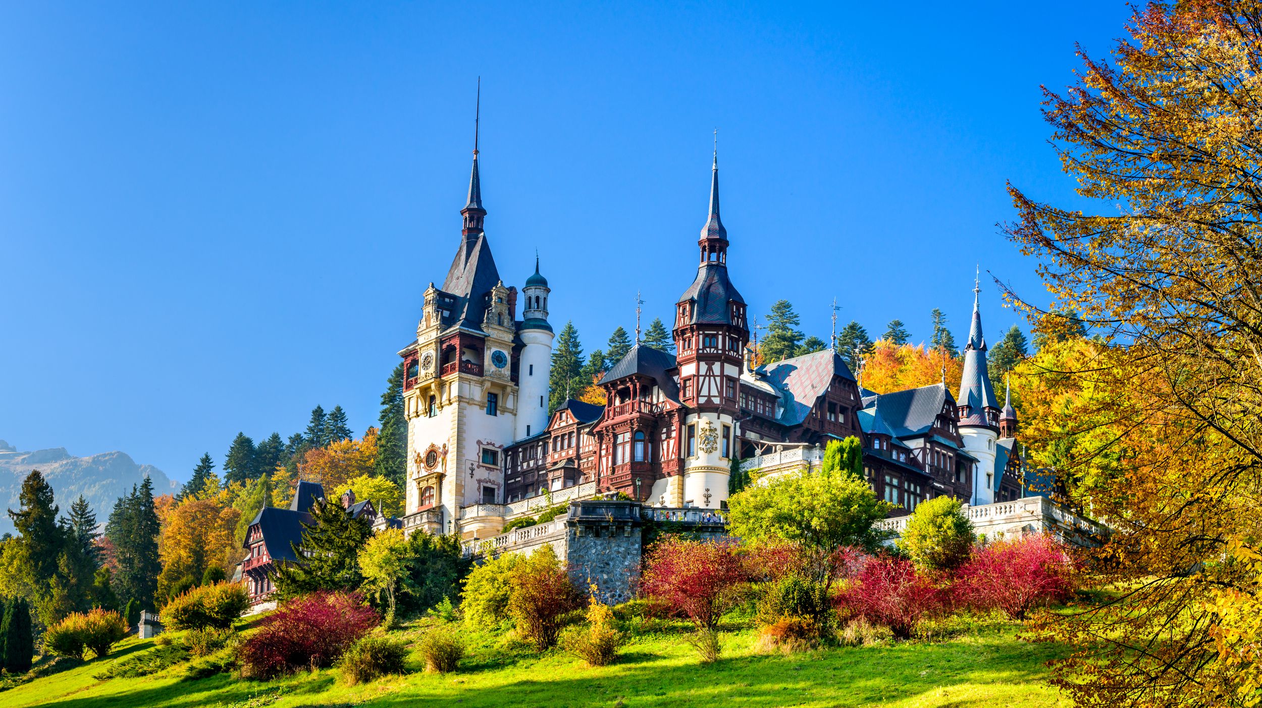 Peles Castle, Romania. Beautiful famous royal castle and ornamental ga