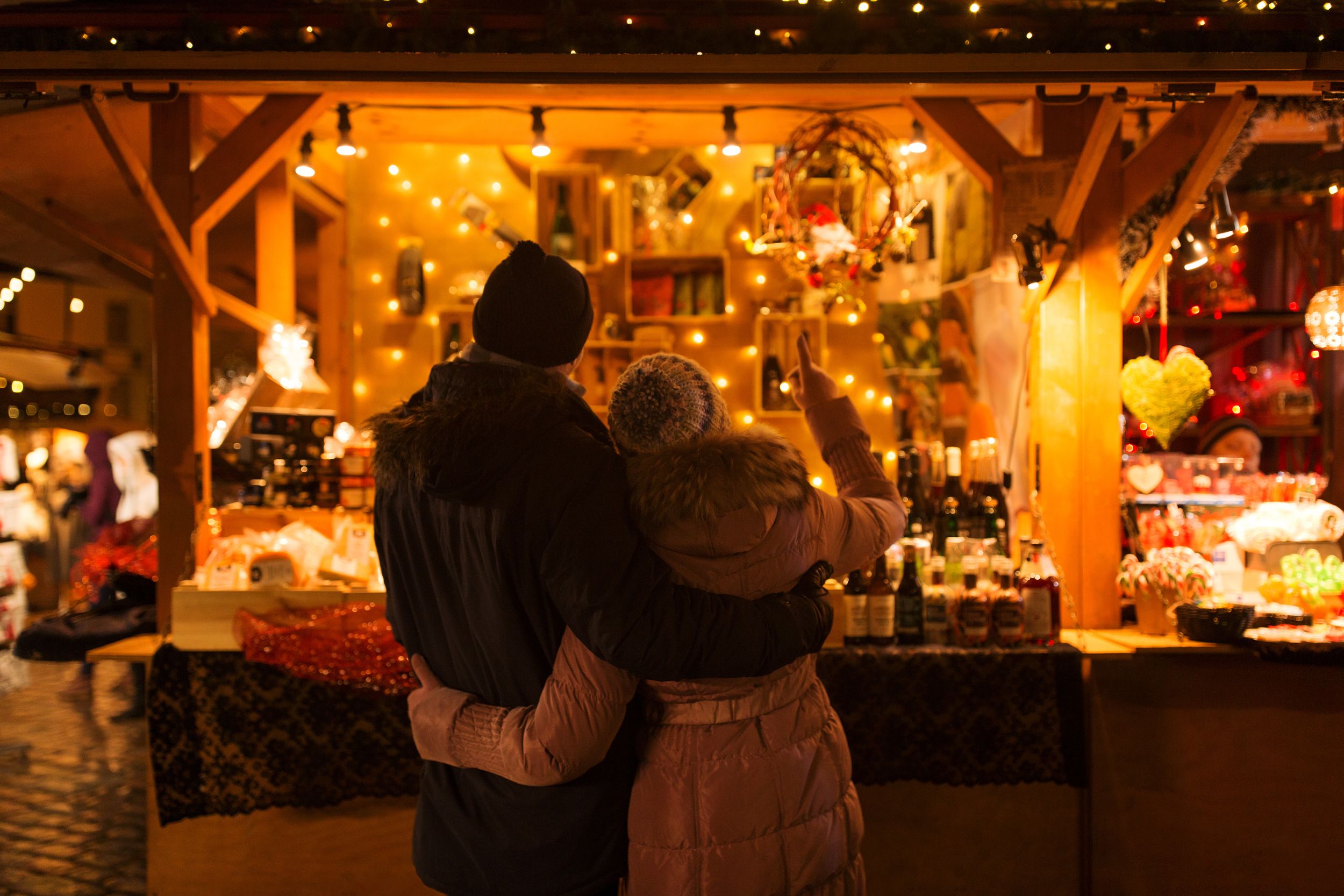 love, winter holidays and people concept - happy senior couple hugging