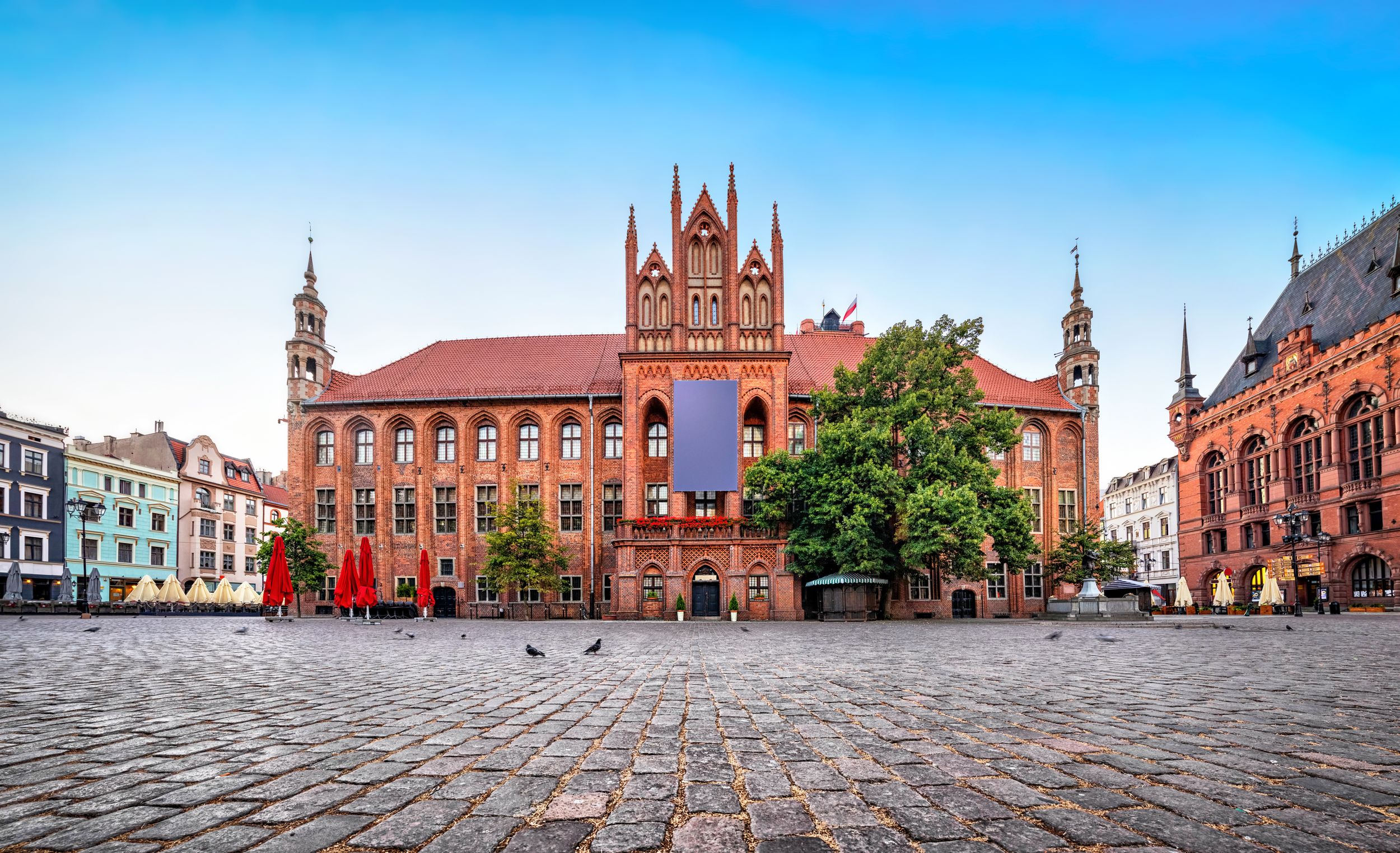 Gothic facade of Old Town Hall of Torun located on Old Market square,