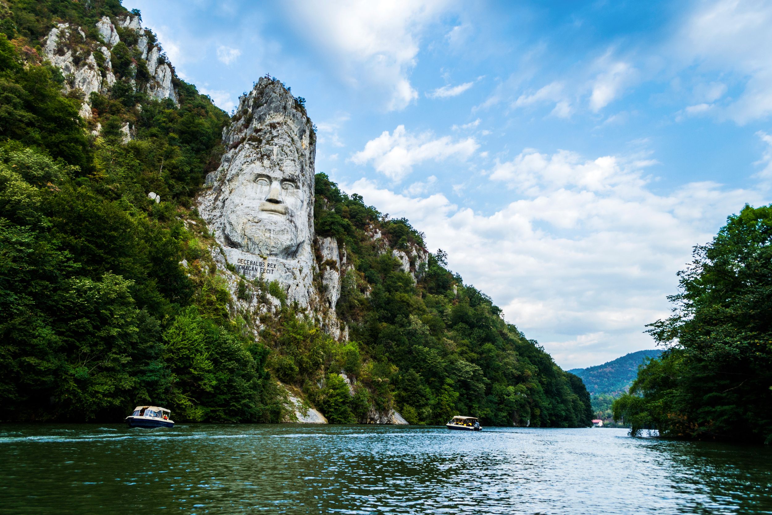 Panoramic view of the Danube river. The face of the Dacian king Deceba