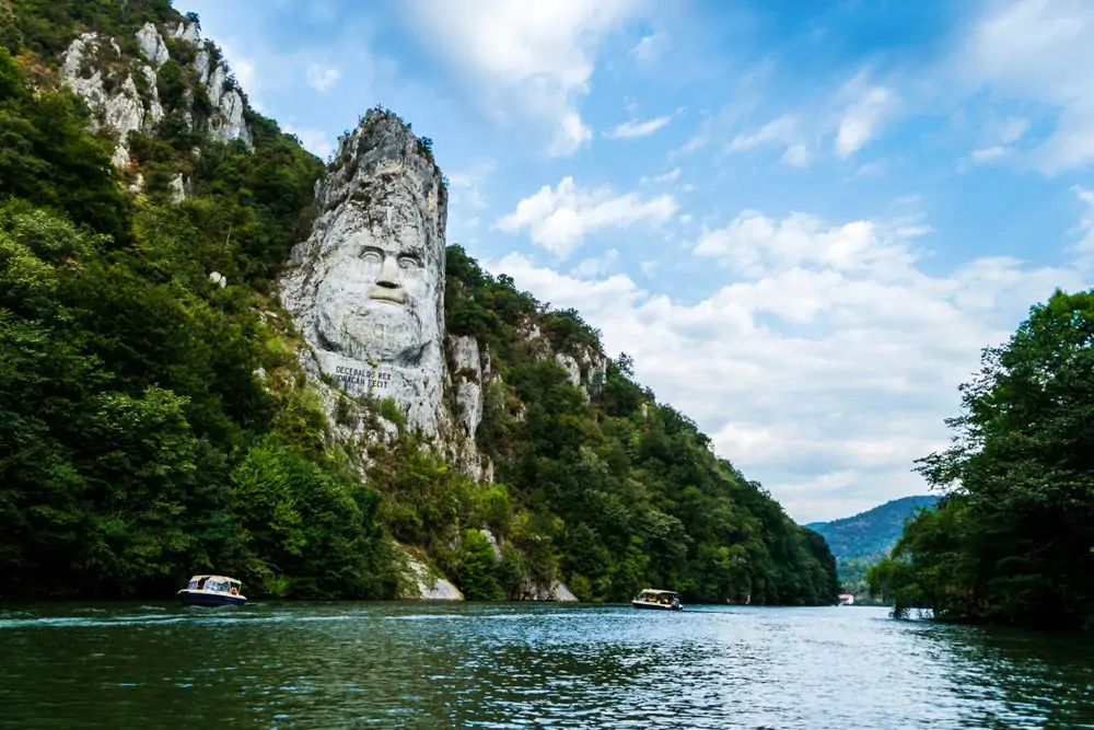 Panoramic view of the Danube river. The face of the Dacian king Deceba
